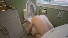 Play Pissing in chastity made a mess cleaned it with my tongue and face